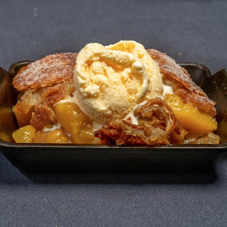 Delicious Peach Cobbler Awaits